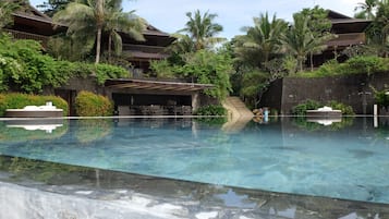 Outdoor pool, open 7:00 AM to 9:00 PM, pool umbrellas, pool loungers