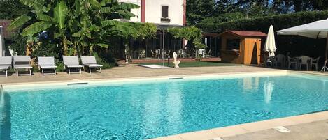 Outdoor pool, open 8 AM to 7:30 PM, sun loungers