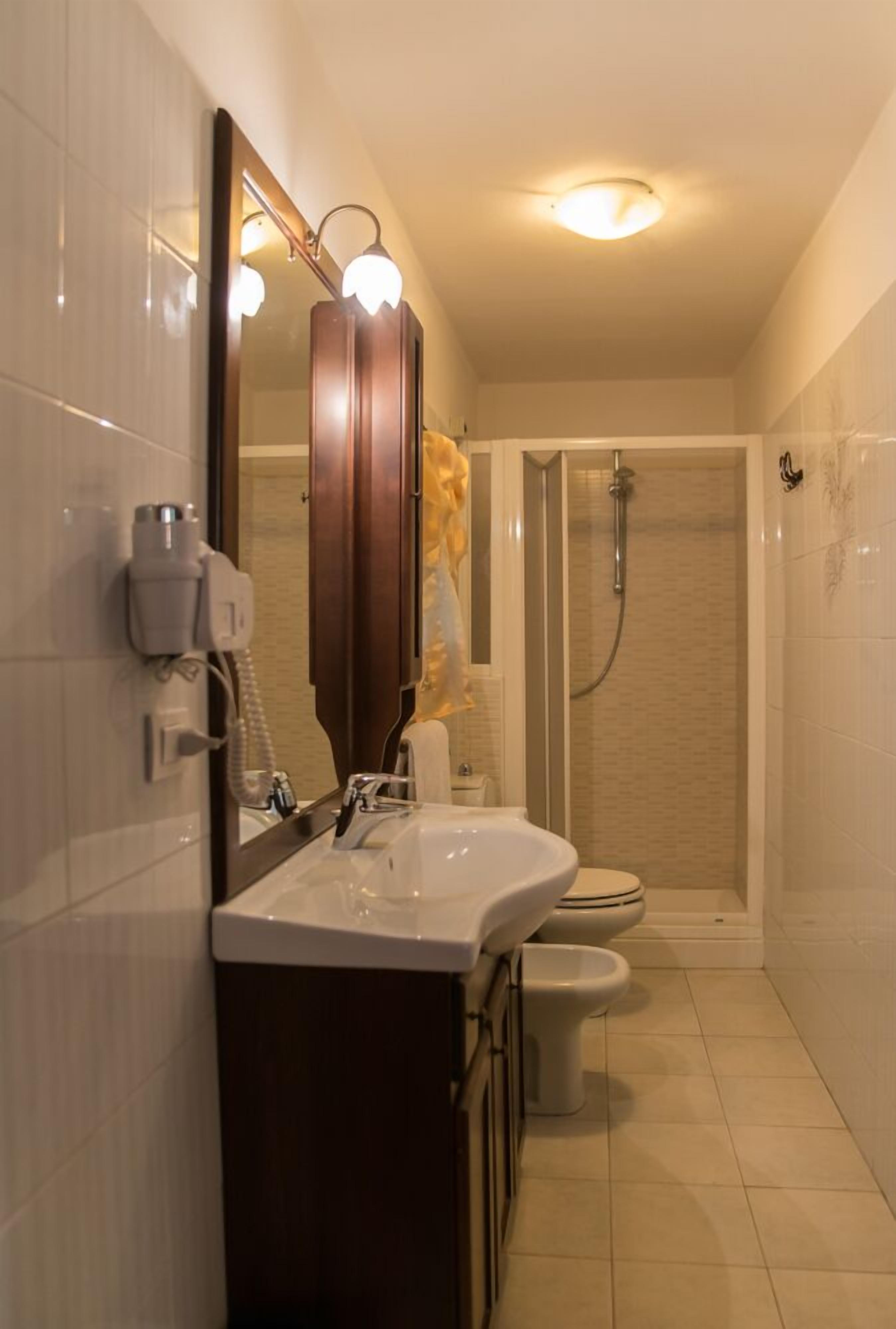 free toiletries, hair dryer, bidet, towels