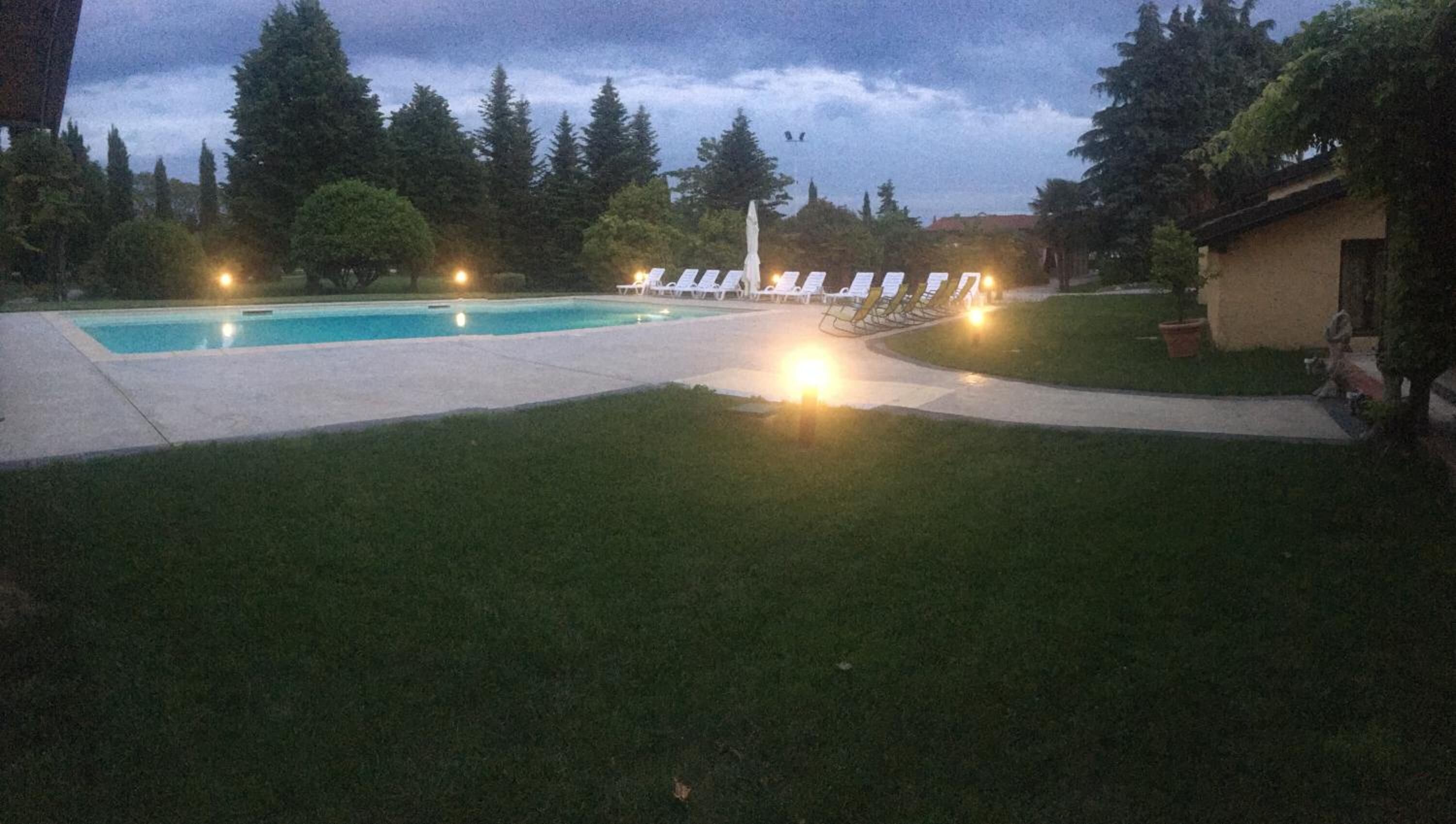 outdoor pool, open 8 am to 7:30 pm, pool loungers