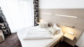 Ropa de cama hipoalergénica y cortinas blackout