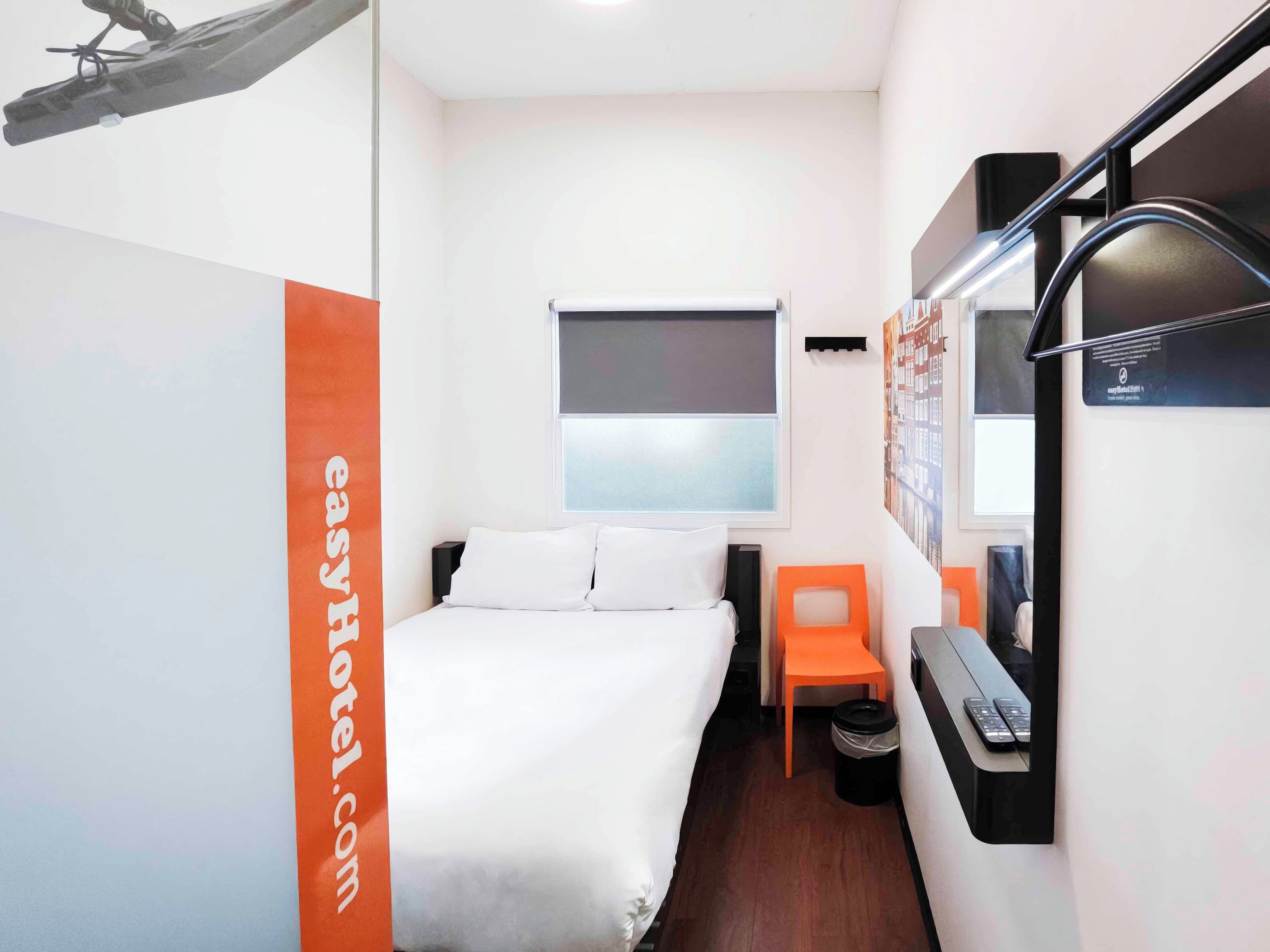 Memory-foam beds, laptop workspace, soundproofing, iron/ironing board