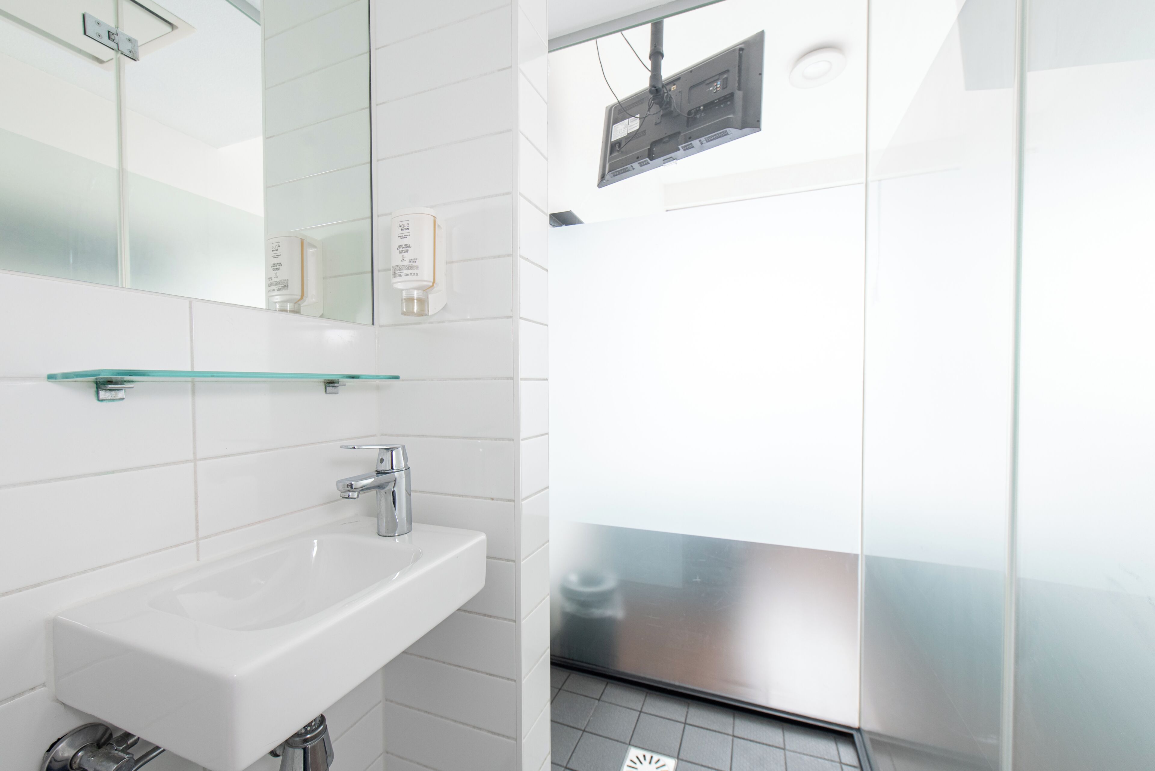 Shower, eco-friendly toiletries, hair dryer, towels