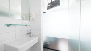 Shower, eco-friendly toiletries, hair dryer, towels
