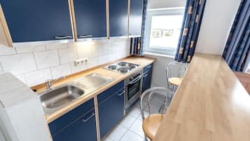 Basic Apartment for 4 people with Kitchenette | Private kitchen | Fridge