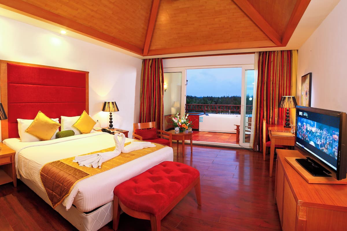 Habitación ejecutiva, vista al resort | Minibar, caja de seguridad en la habitación y escritorio