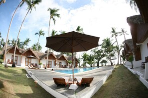 Outdoor pool, open 7:00 AM to 9:00 PM, pool umbrellas - Elysia Beach Resort (Donsol)