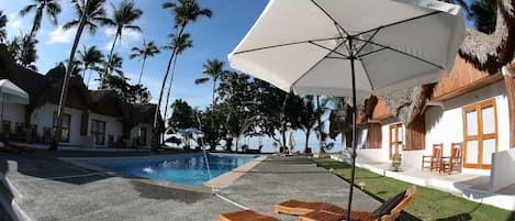 Outdoor pool, open 7:00 AM to 9:00 PM, pool umbrellas