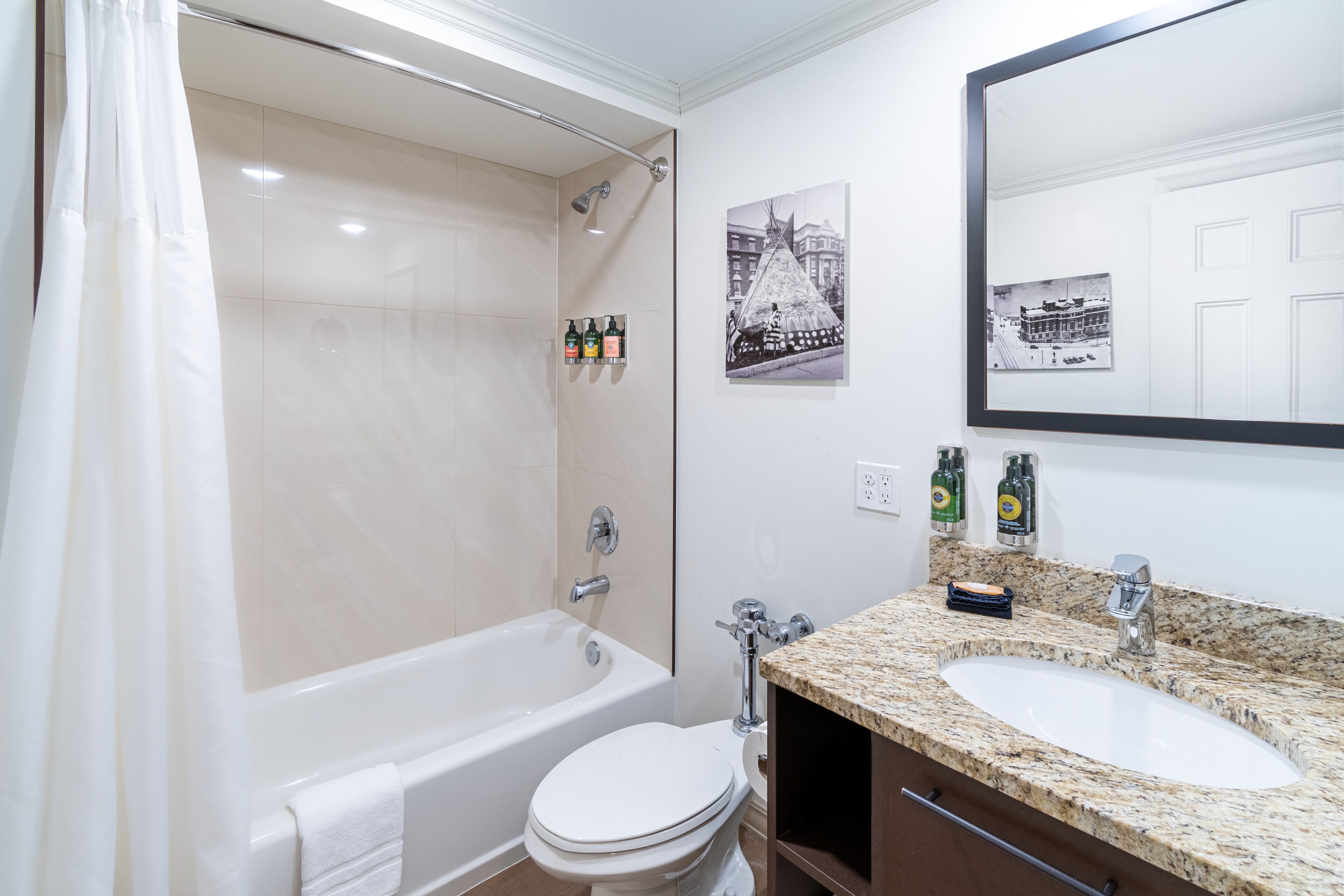 deluxe room, 1 king bed | bathroom | designer toiletries, hair dryer, bathrobes, towels