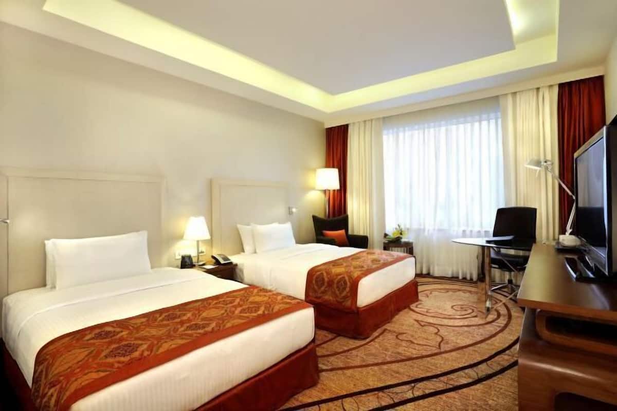 Ropa de cama de alta calidad y minibar