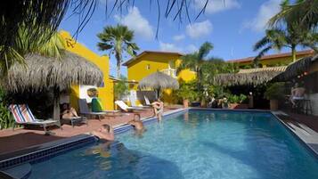 Outdoor pool, pool umbrellas, sun loungers
