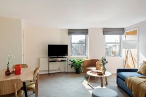 Coffres-forts dans les chambres, fer et planche à repasser