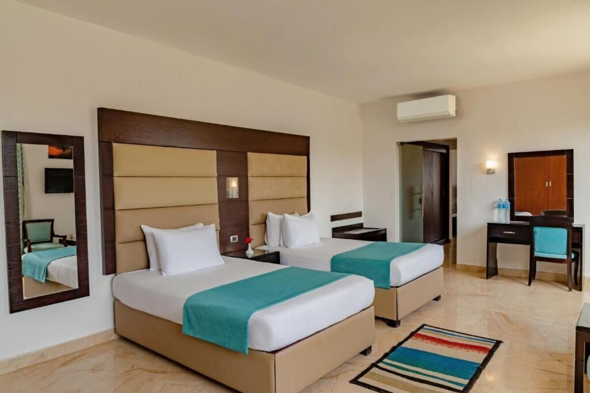 Roupas de cama de algodão egípcio, frigobar, cofres nos quartos