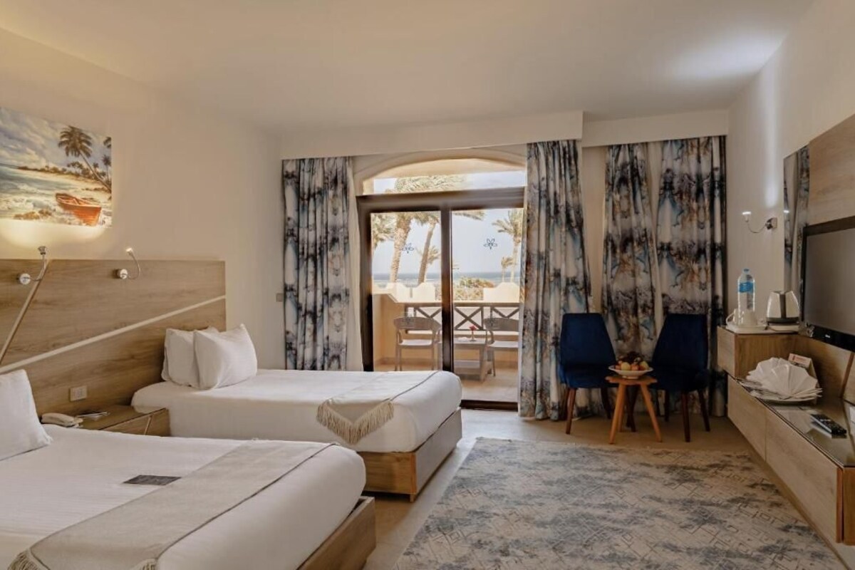 Roupas de cama de algodão egípcio, frigobar, cofres nos quartos