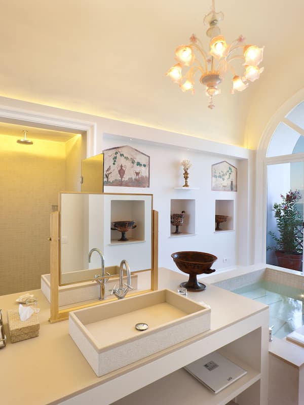 Studio Suite, Hot Tub, Sea View (Pompeiana) | Bathroom | Rainfall showerhead, free toiletries, hair dryer, bathrobes