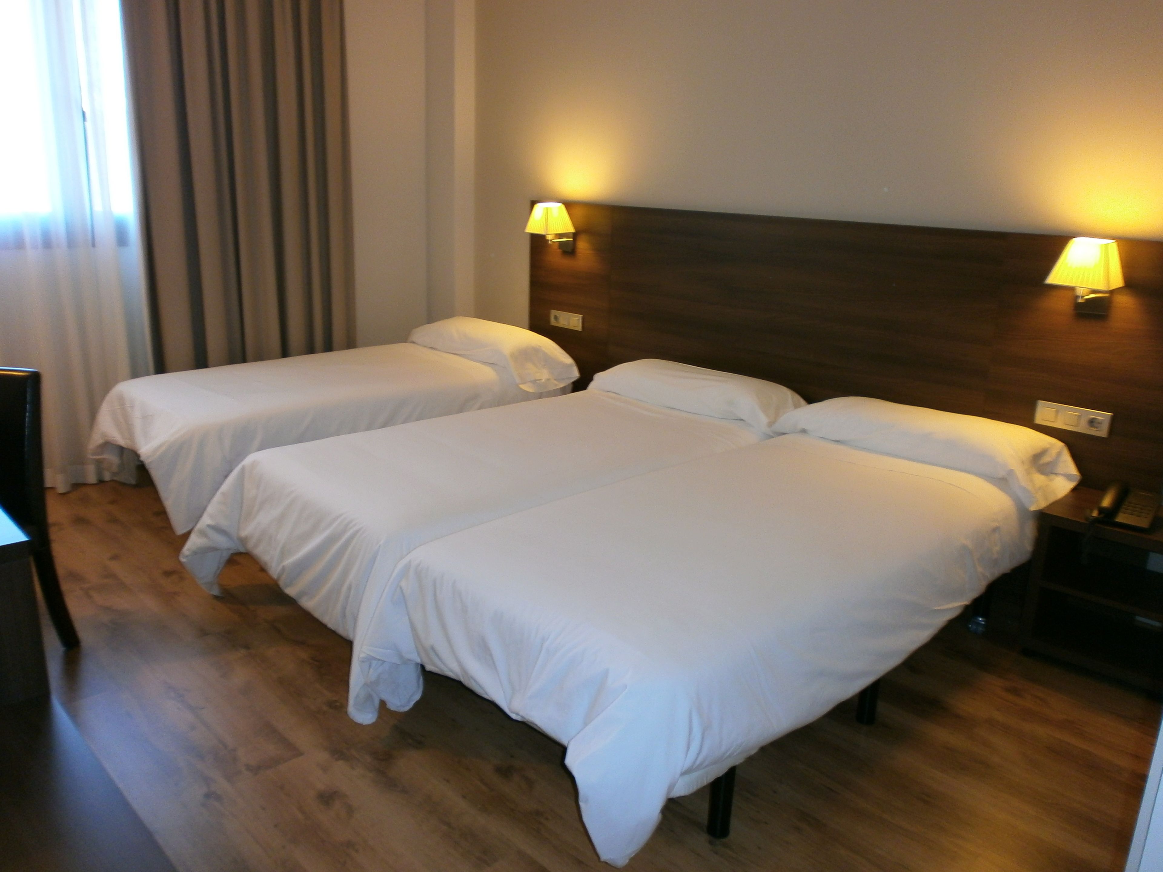 triple room | in-room safe, desk, blackout curtains, soundproofing