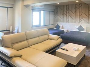 Chambre Premium avec lits jumeaux, fumeurs | Bureau, fer et planche à repasser, Wi-Fi gratuit