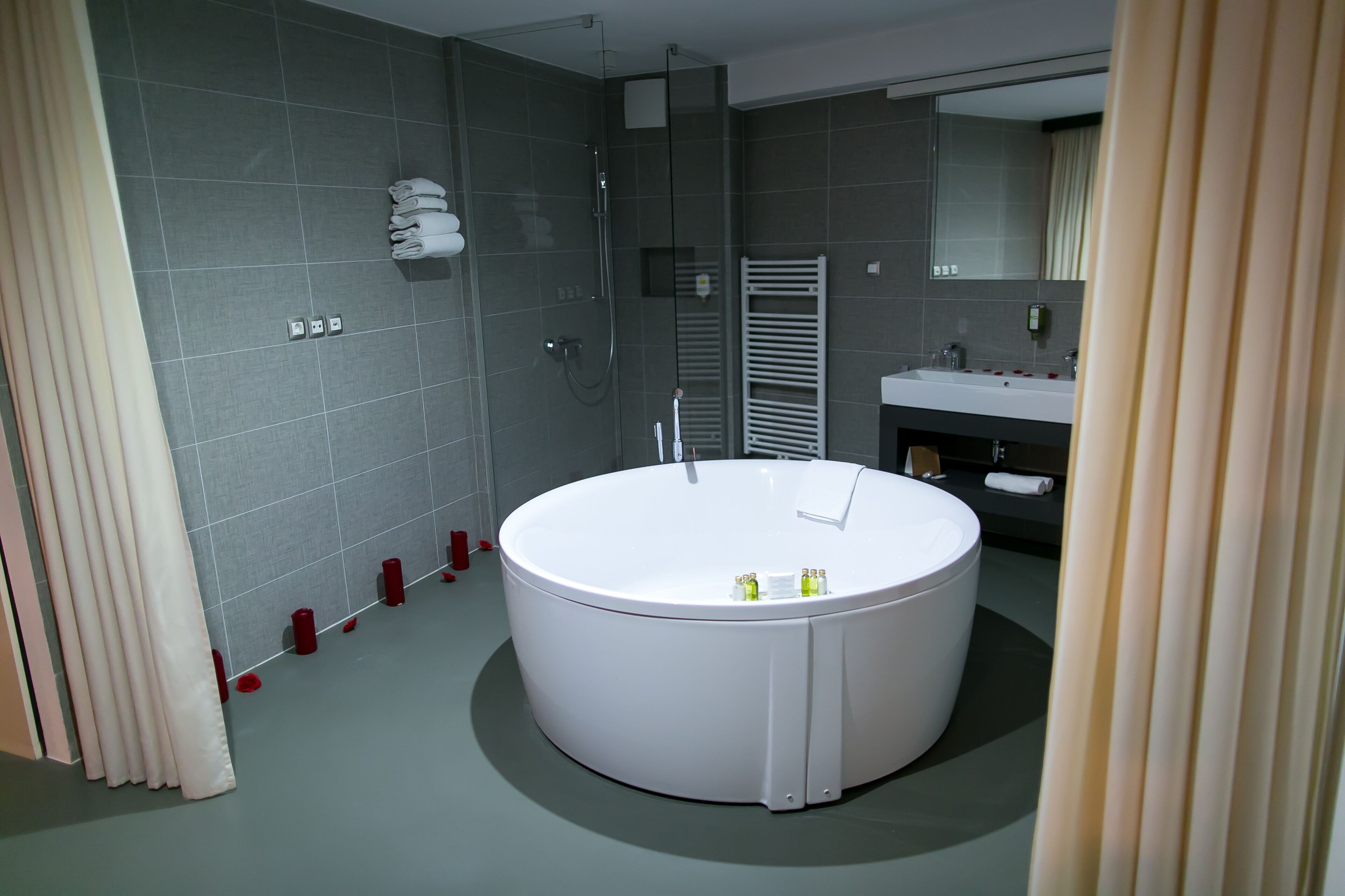 romantic suite | bathroom | hair dryer, bathrobes, bidet, towels