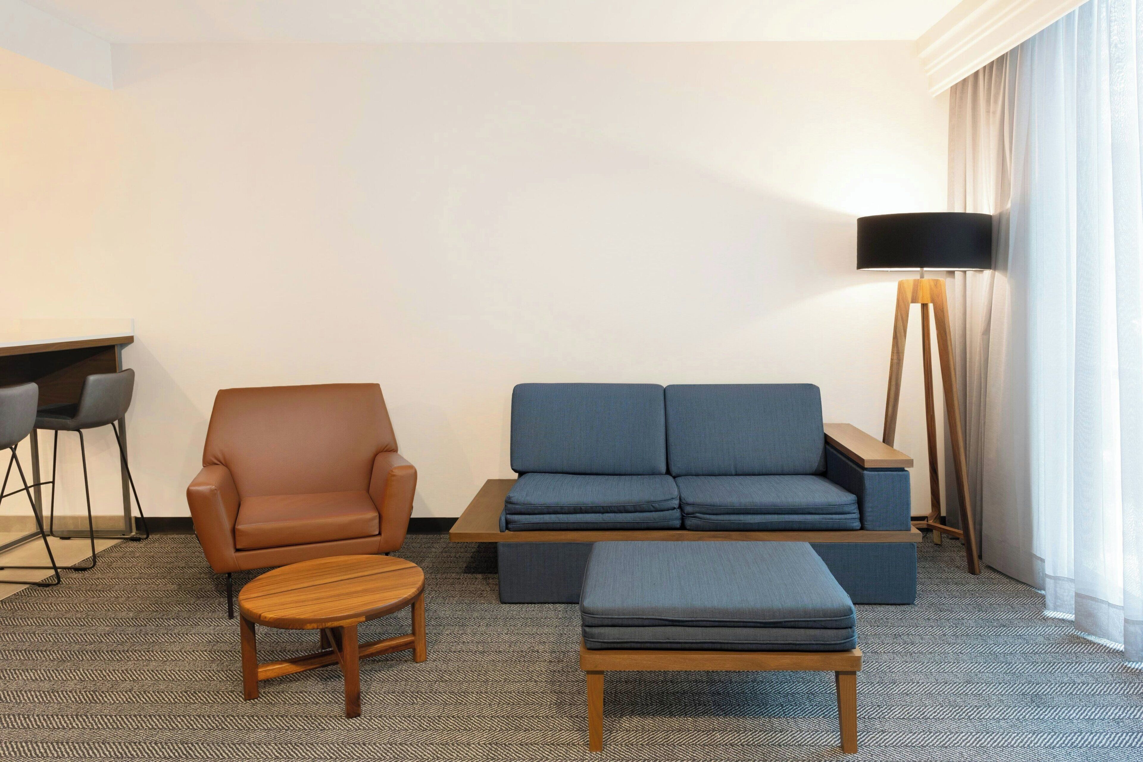 suite, 1 king bed with sofa bed | living room | 32-inch lcd tv with satellite channels, tv, ipod dock