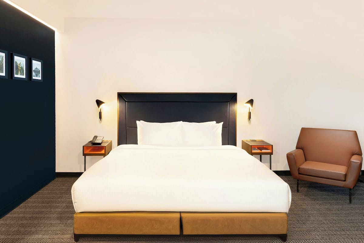 Suite, 1 King Bed with Sofa bed | 1 bedroom, hypo-allergenic bedding, pillowtop beds, in-room safe