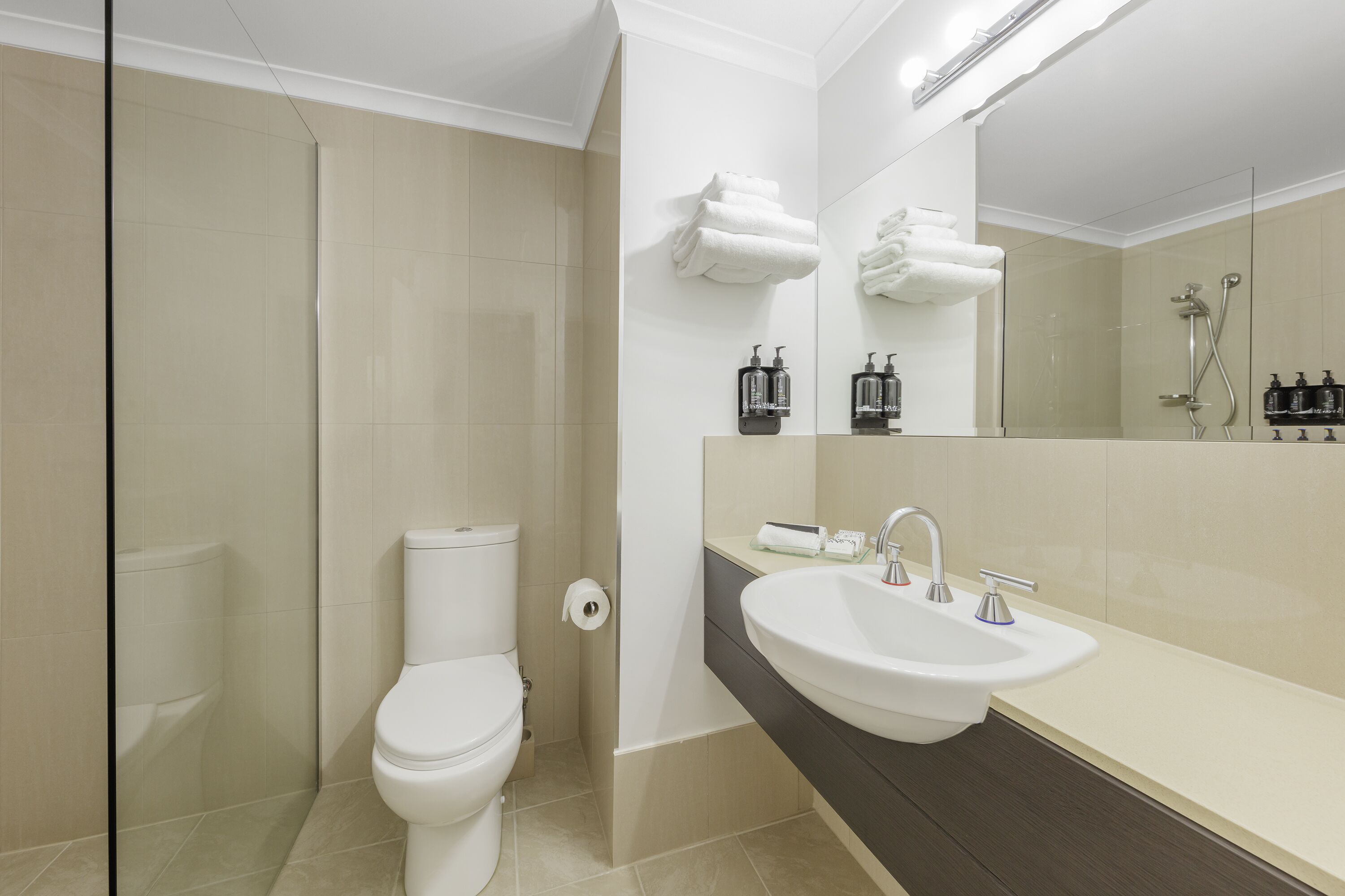 shower, rainfall showerhead, designer toiletries, hair dryer