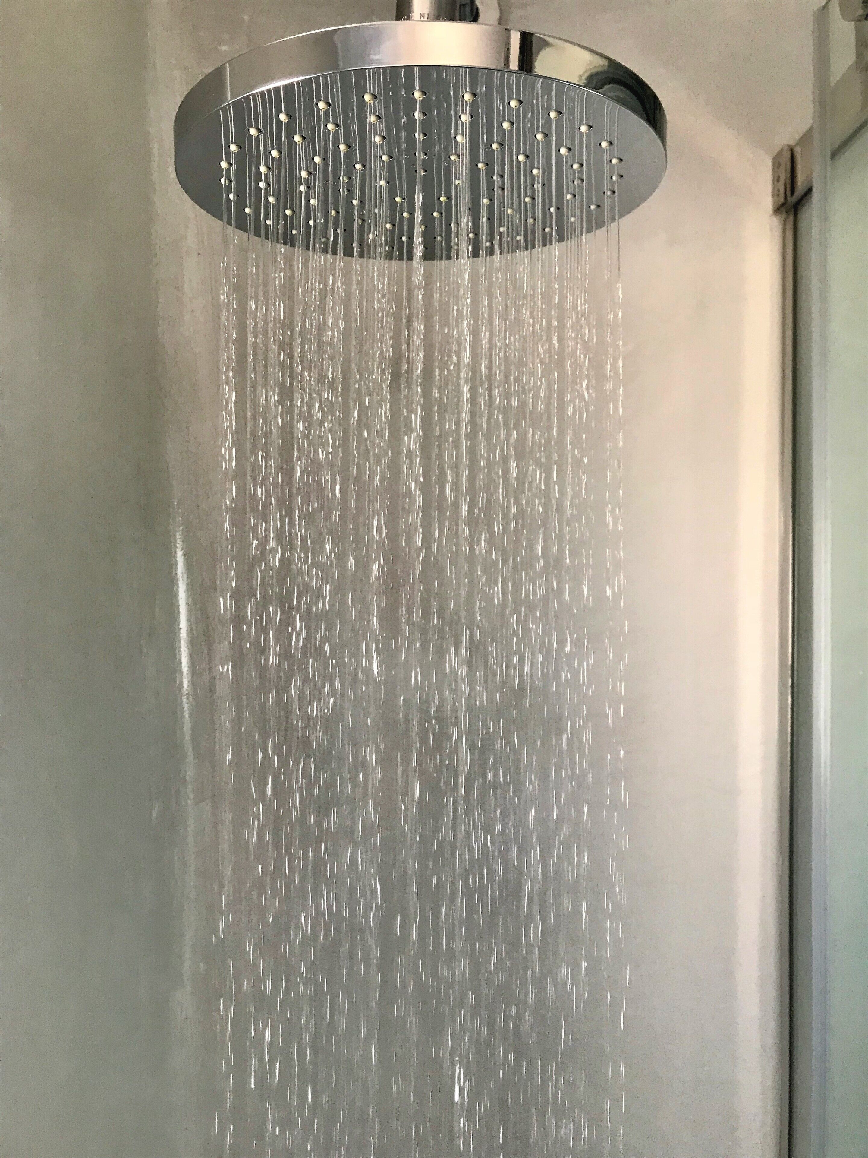 standard double room | bathroom | shower, hair dryer, slippers, towels