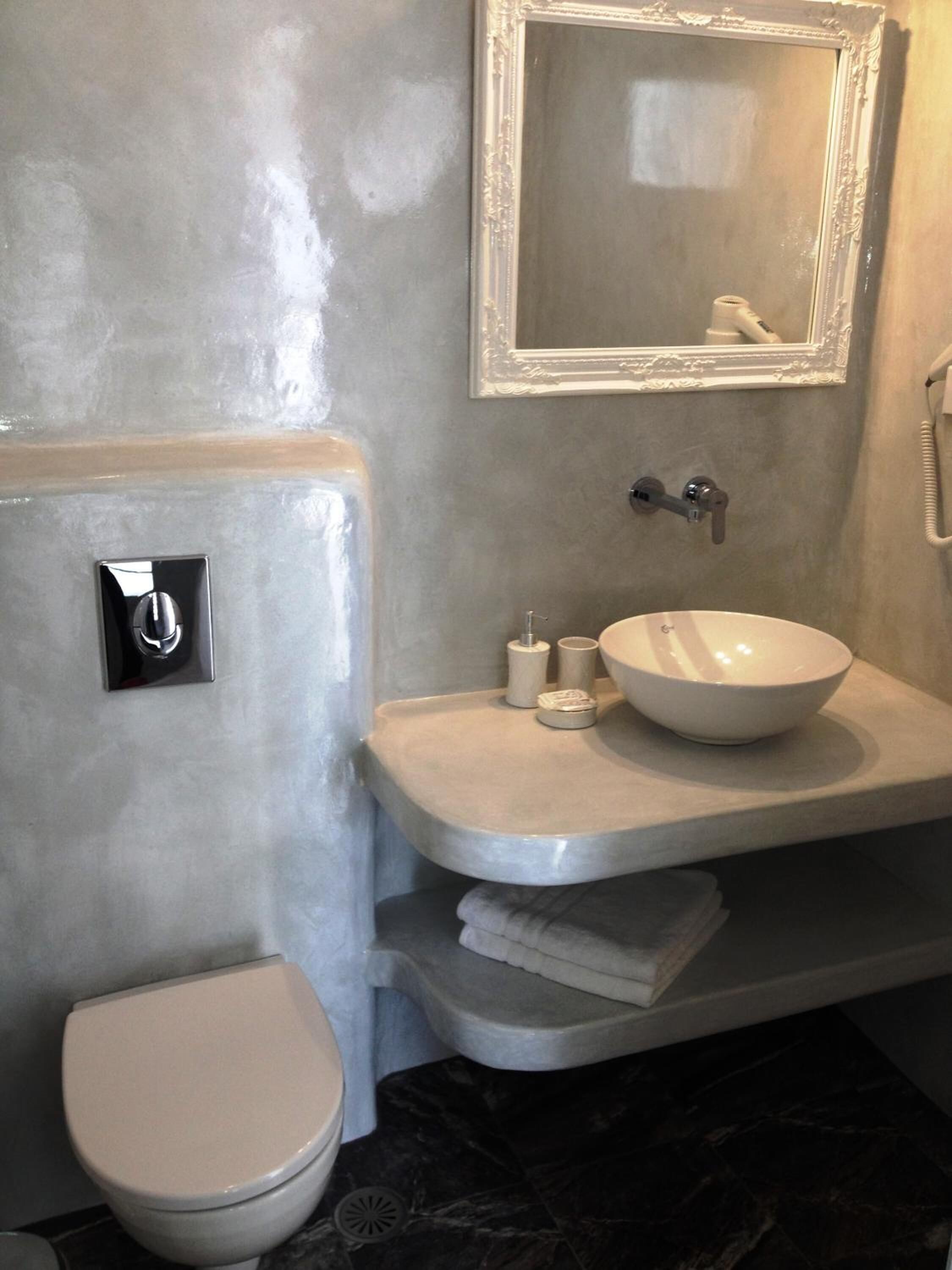 superior room | bathroom | shower, hair dryer, slippers, towels