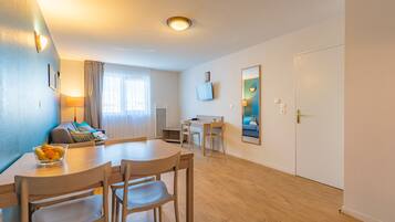 Large Apartment | Living area | Flat-screen TV