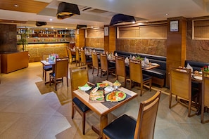 Lunch and dinner served - Coraltree By Goldfinch Hotels Bangalore (Bengaluru)
