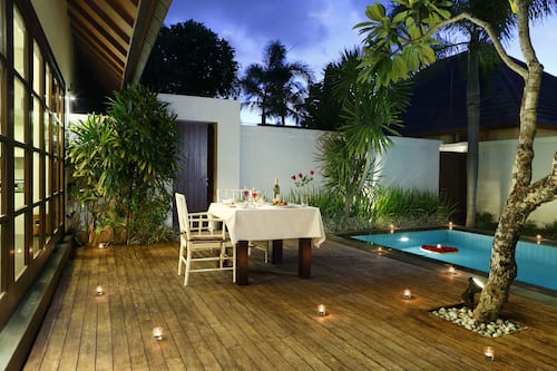 Outdoor pool, pool umbrellas, pool loungers