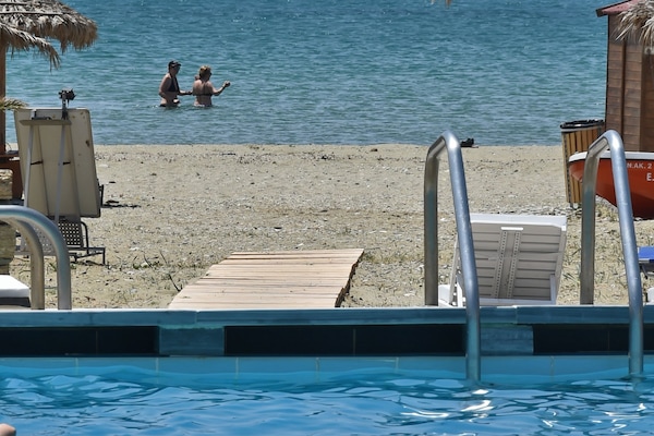 Outdoor pool, open 9:30 AM to 3:30 PM, sun loungers