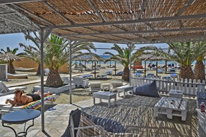 On the beach, sun-loungers, beach umbrellas
