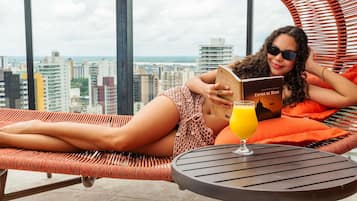 Indoor pool, open 10:00 AM to 10:00 PM, sun loungers