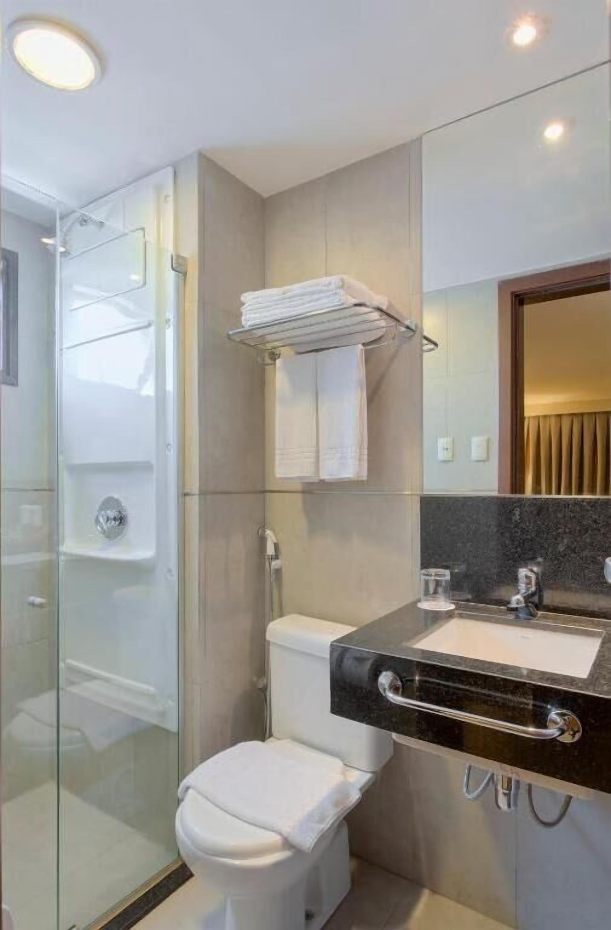 shower, eco-friendly toiletries, hair dryer, towels