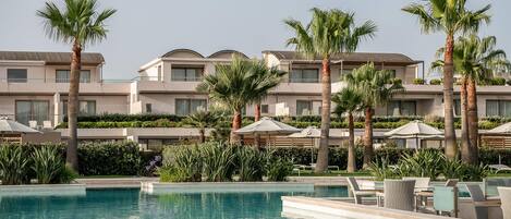 Indoor pool, 4 outdoor pools, open 9:00 AM to 7:00 PM, pool umbrellas