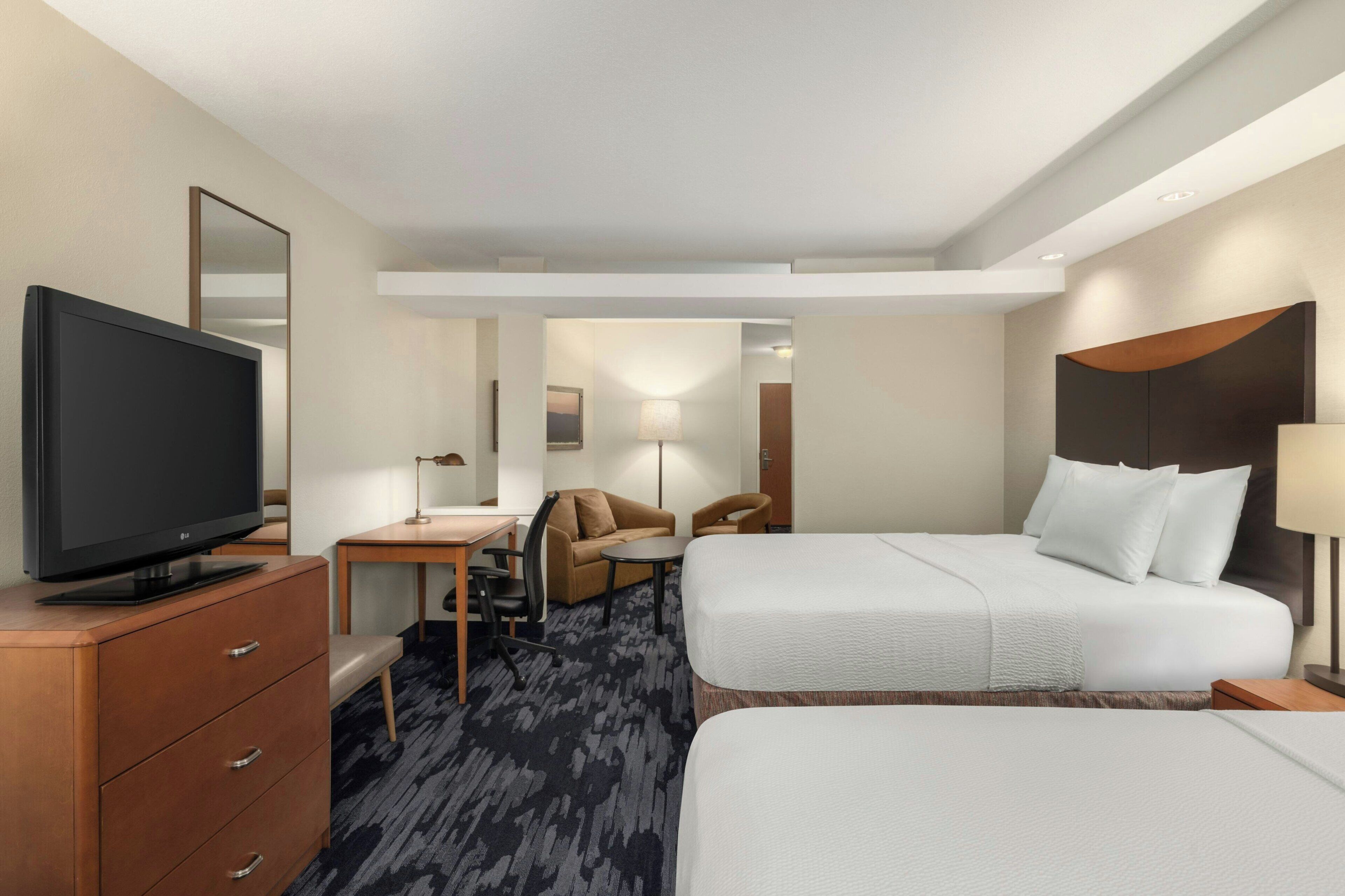 Premium bedding, down duvets, in-room safe, desk