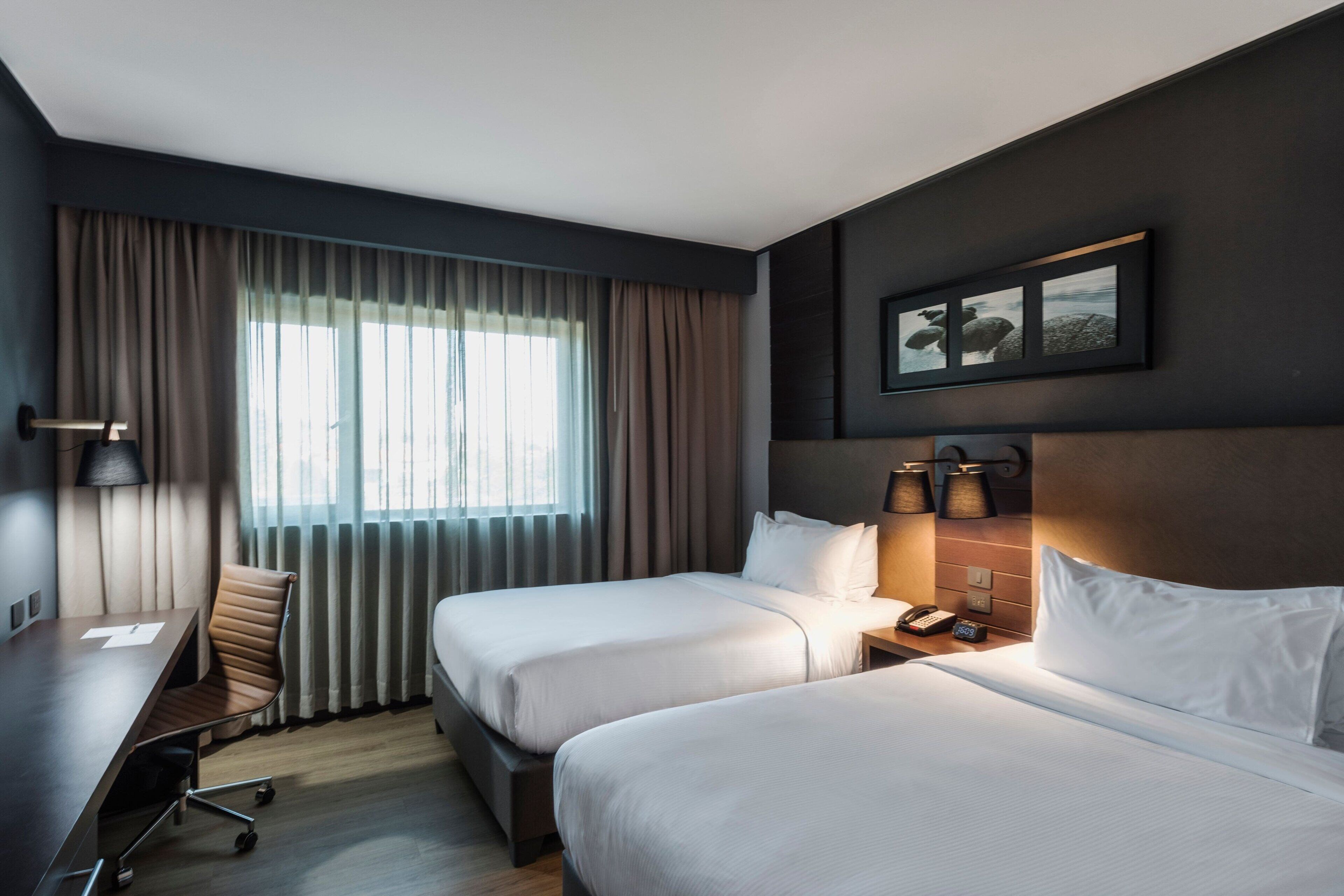 room, 2 single beds | 1 bedroom, in-room safe, desk, laptop workspace