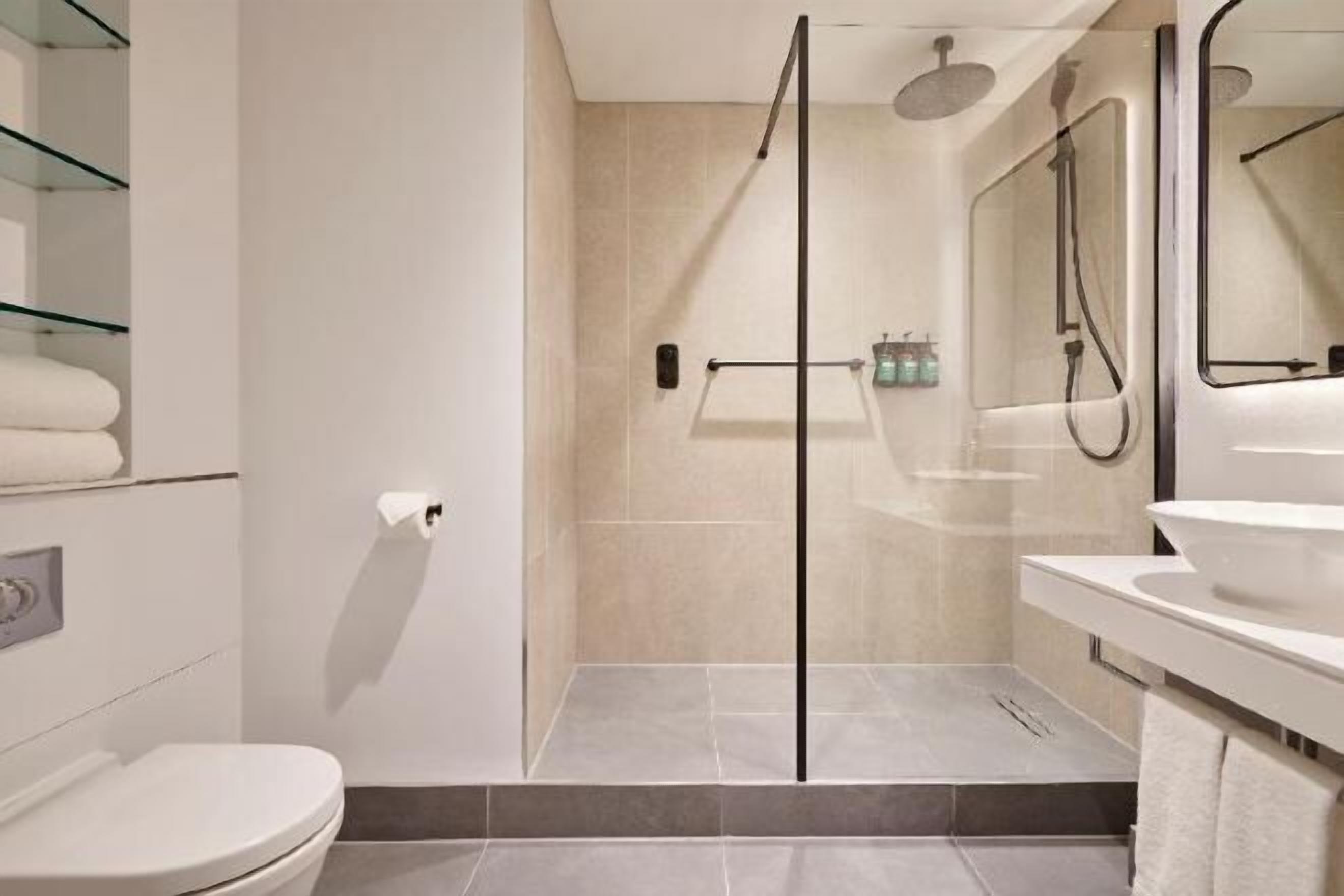 Bathroom | Shower, free toiletries, hair dryer, towels