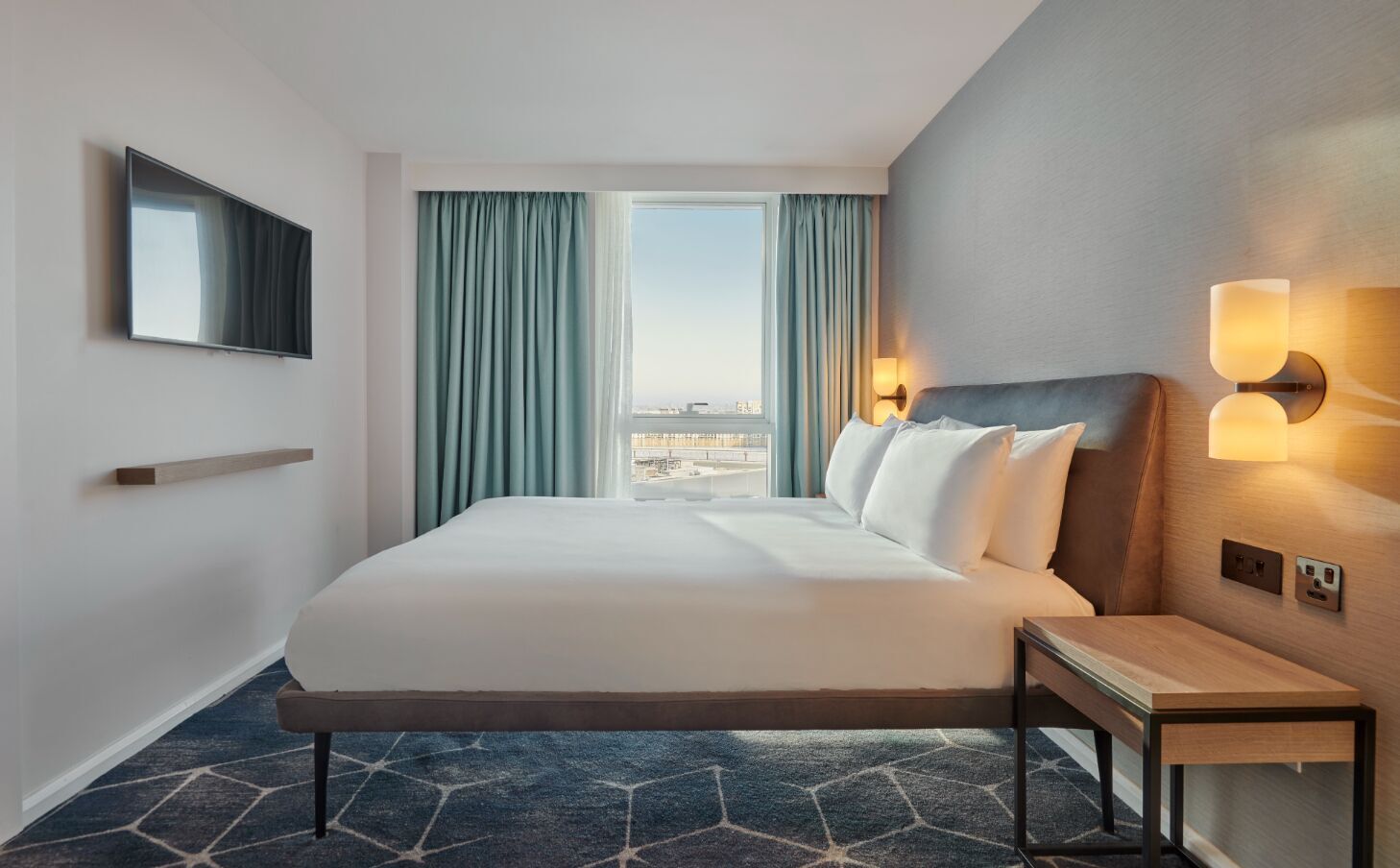 Hypo-allergenic bedding, in-room safe, desk, laptop workspace