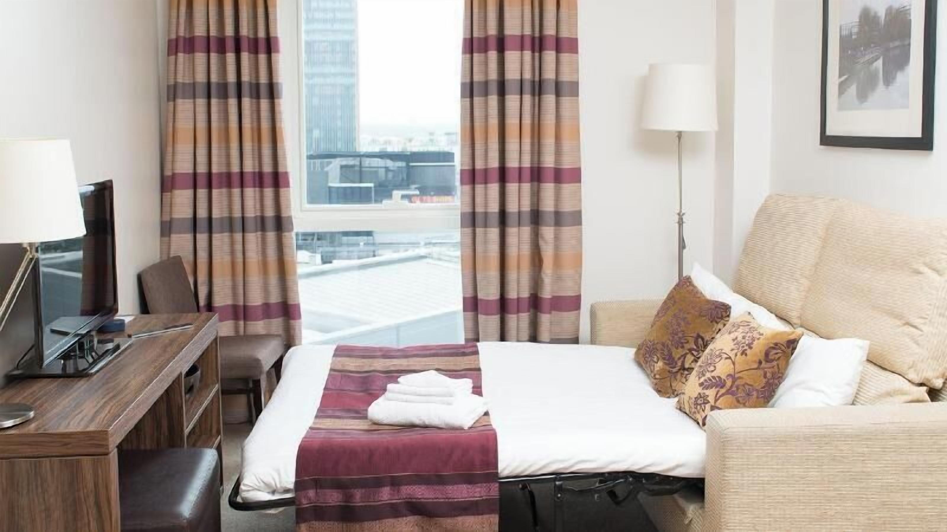 Hypo-allergenic bedding, in-room safe, desk, laptop workspace