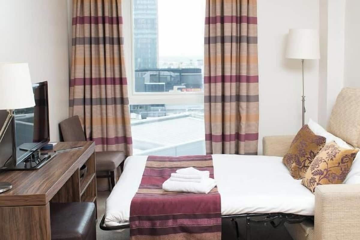 Hypo-allergenic bedding, in-room safe, desk, laptop workspace