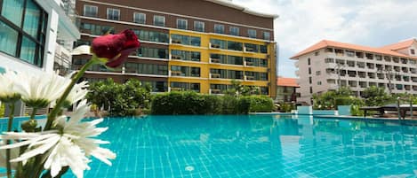 Outdoor pool, pool umbrellas, sun loungers