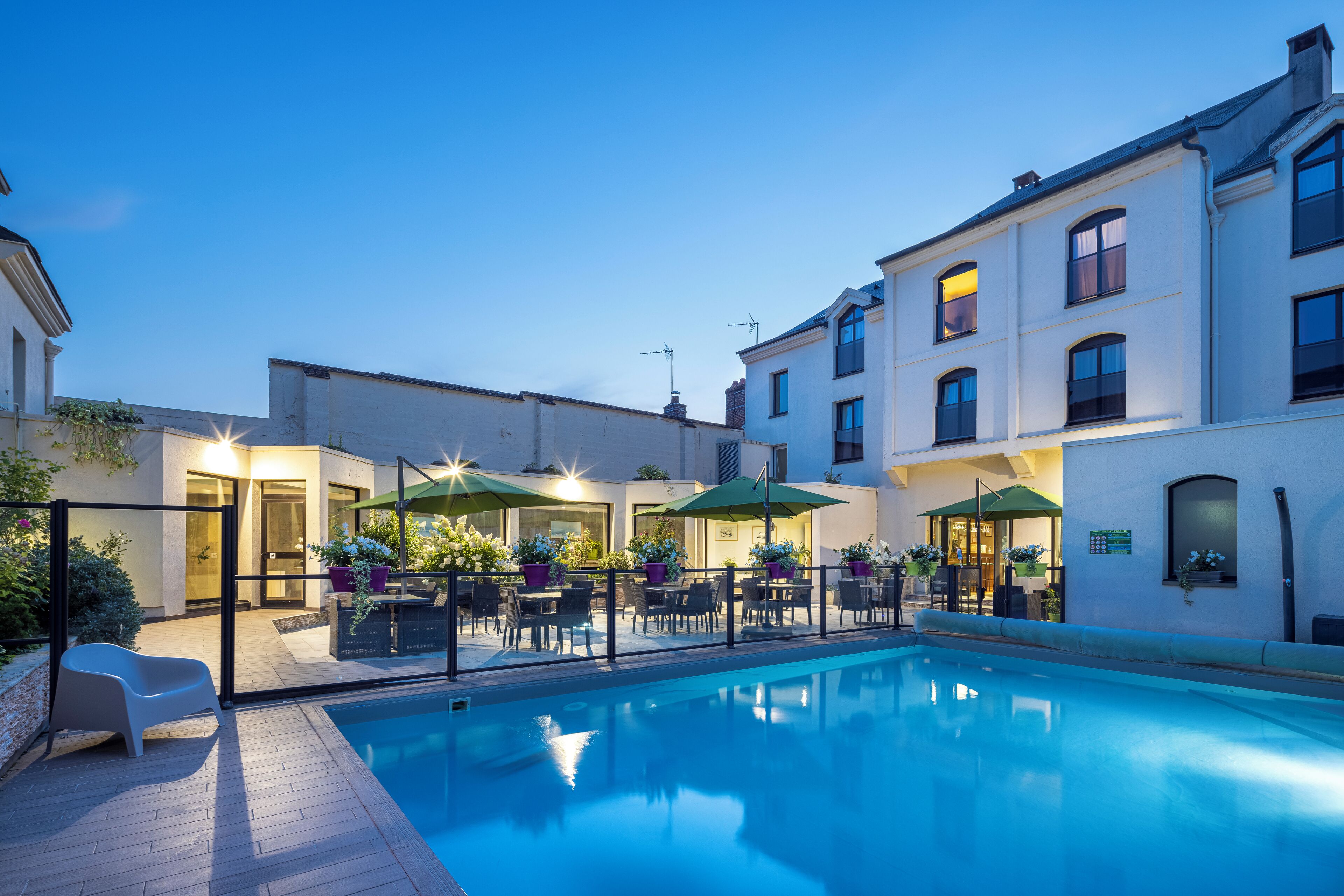 seasonal outdoor pool, open 9 am to 9 pm, pool umbrellas, pool loungers