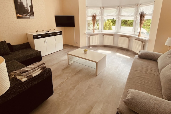 Standard Apartment, 2 Bedrooms, Kitchen | Living area | 23-inch flat-screen TV with cable channels, LCD TV, tablet