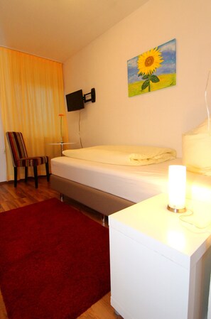 Chambre Simple, salle de bains commune | Coin séjour