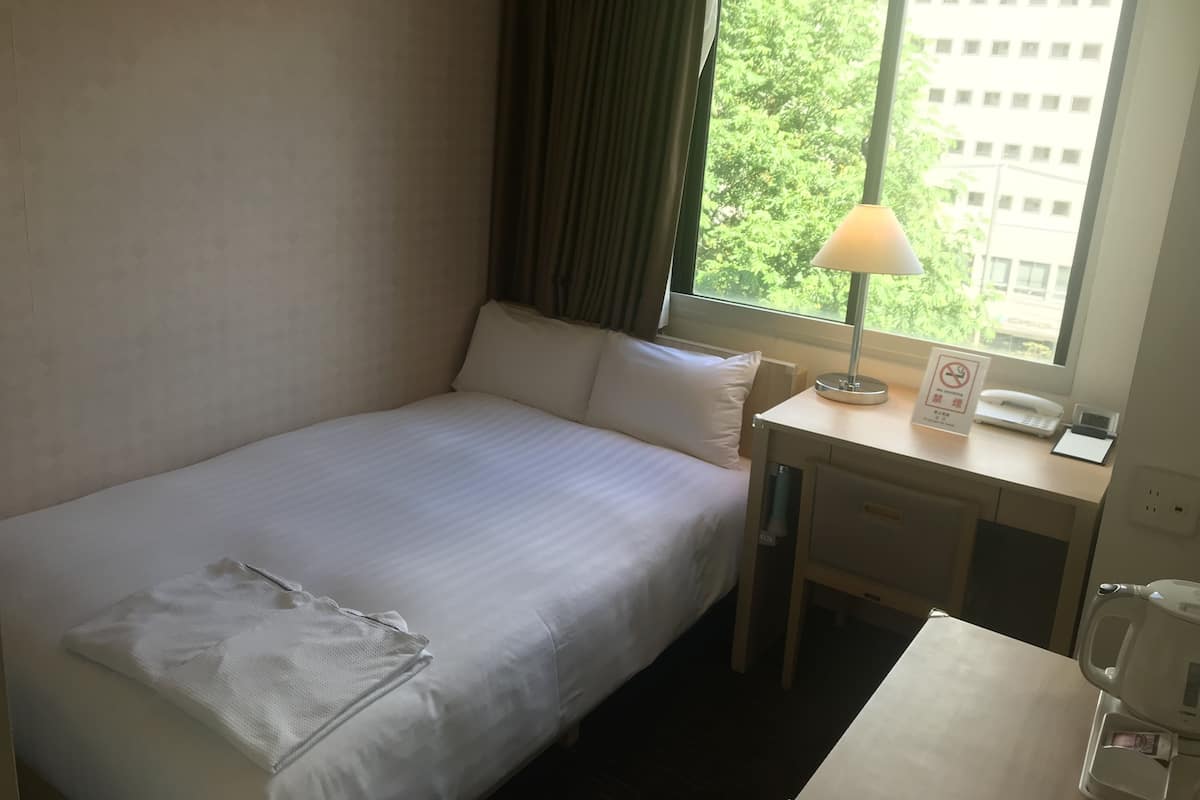 Down duvets, desk, blackout curtains, soundproofing