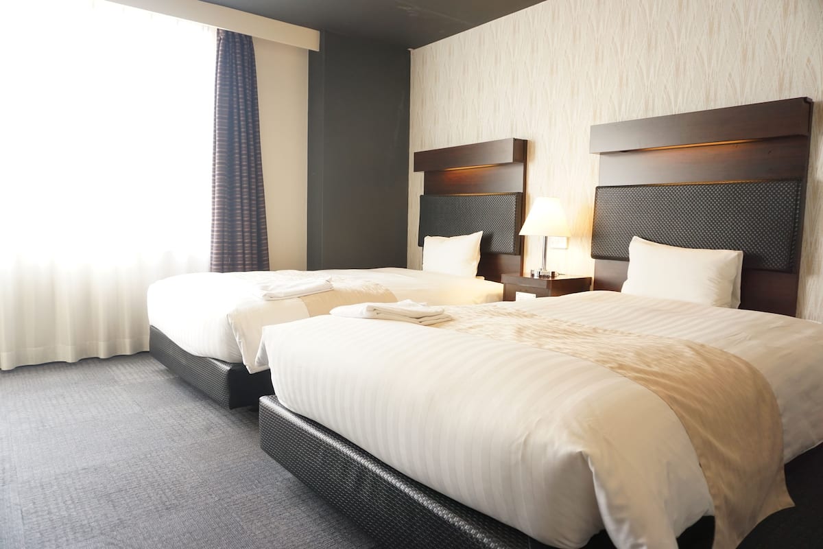Down duvets, desk, blackout curtains, soundproofing