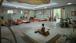 A spacious lobby with a central seating area, a reception desk, and a large potted plant. - THE PRIVILEGE FLOOR by Borei Angkor (Siem Reap)