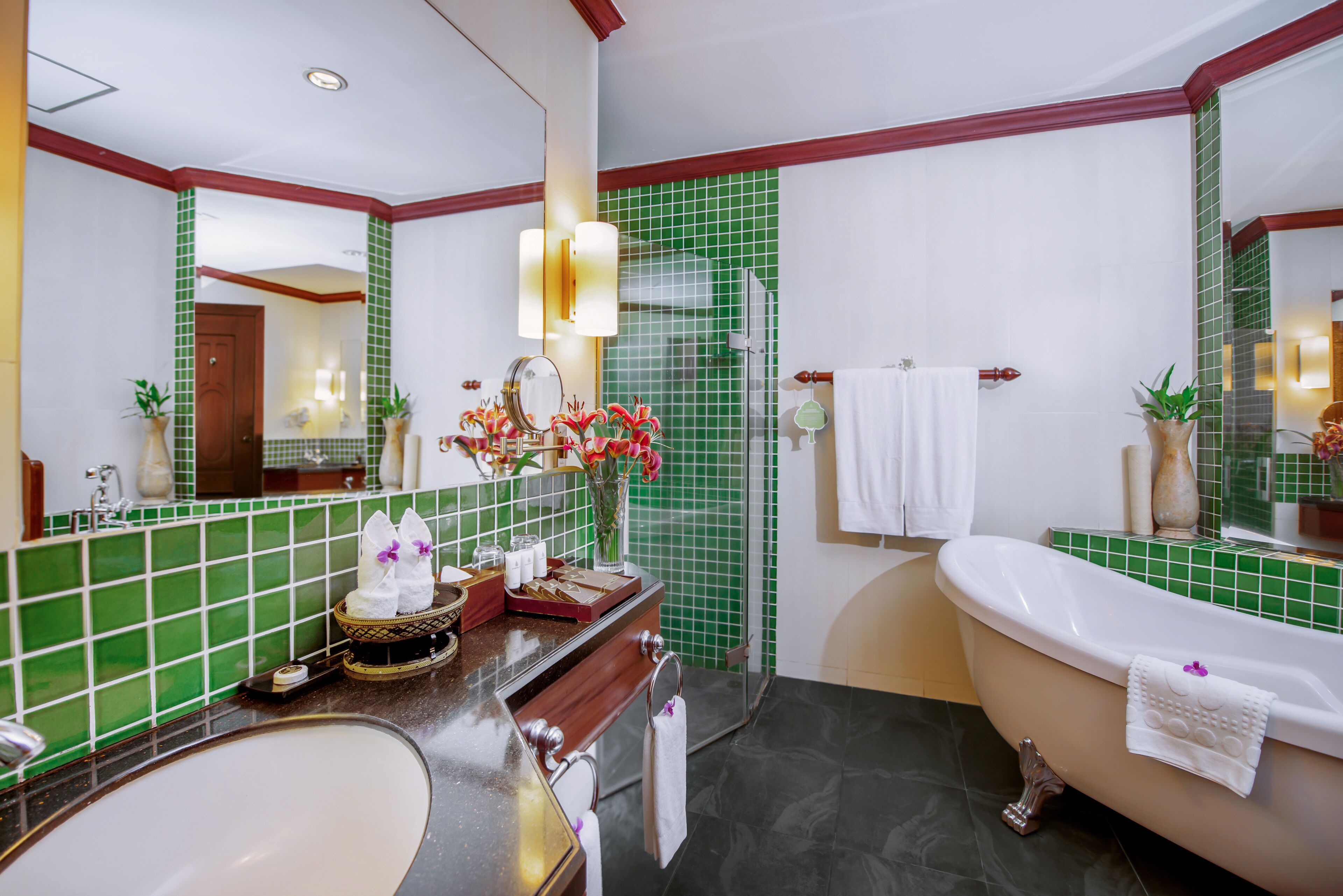 separate bathtub and shower, rainfall showerhead, designer toiletries