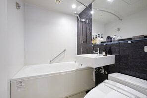 Basic Twin Room | Bathroom | Combined shower/tub, free toiletries, hair dryer, slippers